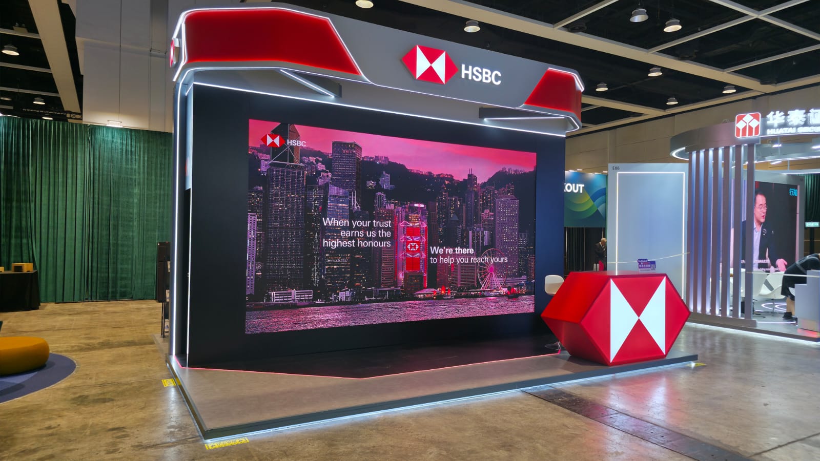 HSBC exhibition booth with black and grey interior design and LED display screen