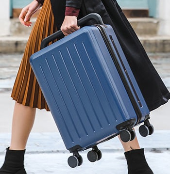 Luggage suitcase with a wide handle